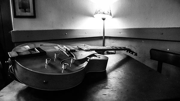 a guitar lying on a table